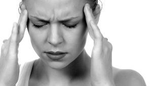 Woman with migraine headache 2